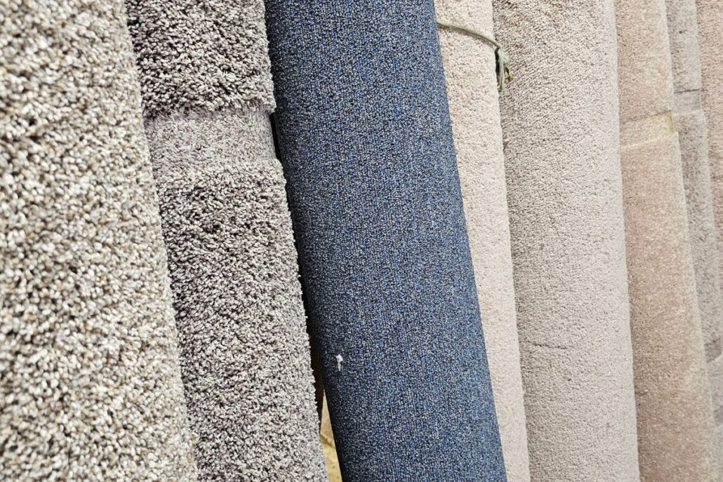 A photo of various carpet remnant rolls in the warehouse at Carpet Barn in New Cumberland, PA