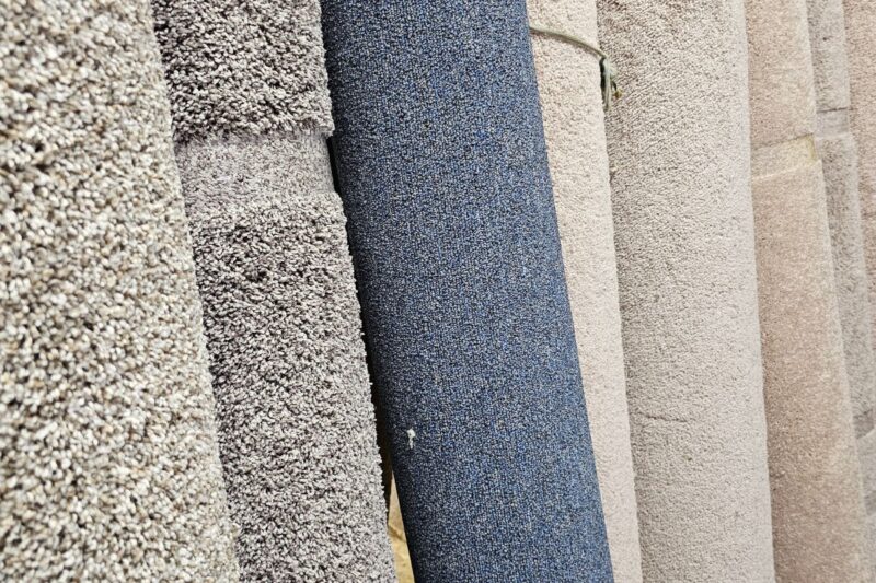 A photo of various carpet remnant rolls in the warehouse at Carpet Barn in New Cumberland, PA